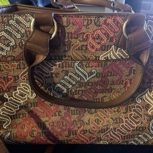 Juicy couture bag slightly stained in the purse but could be fix not noticeable